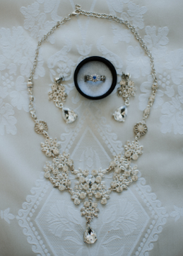 Custom bridal jewelry collection set on white fabric