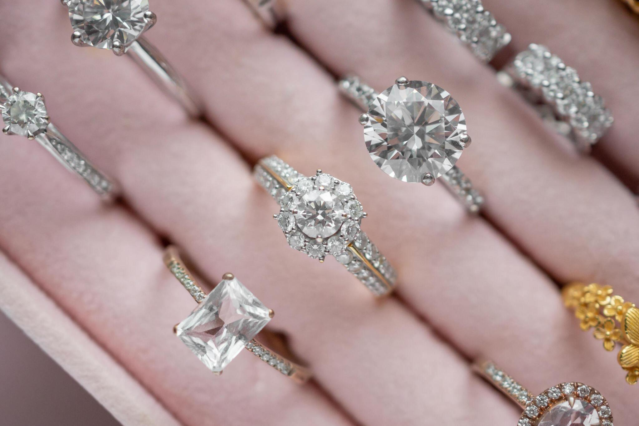 Diamond rings displayed on pink tray