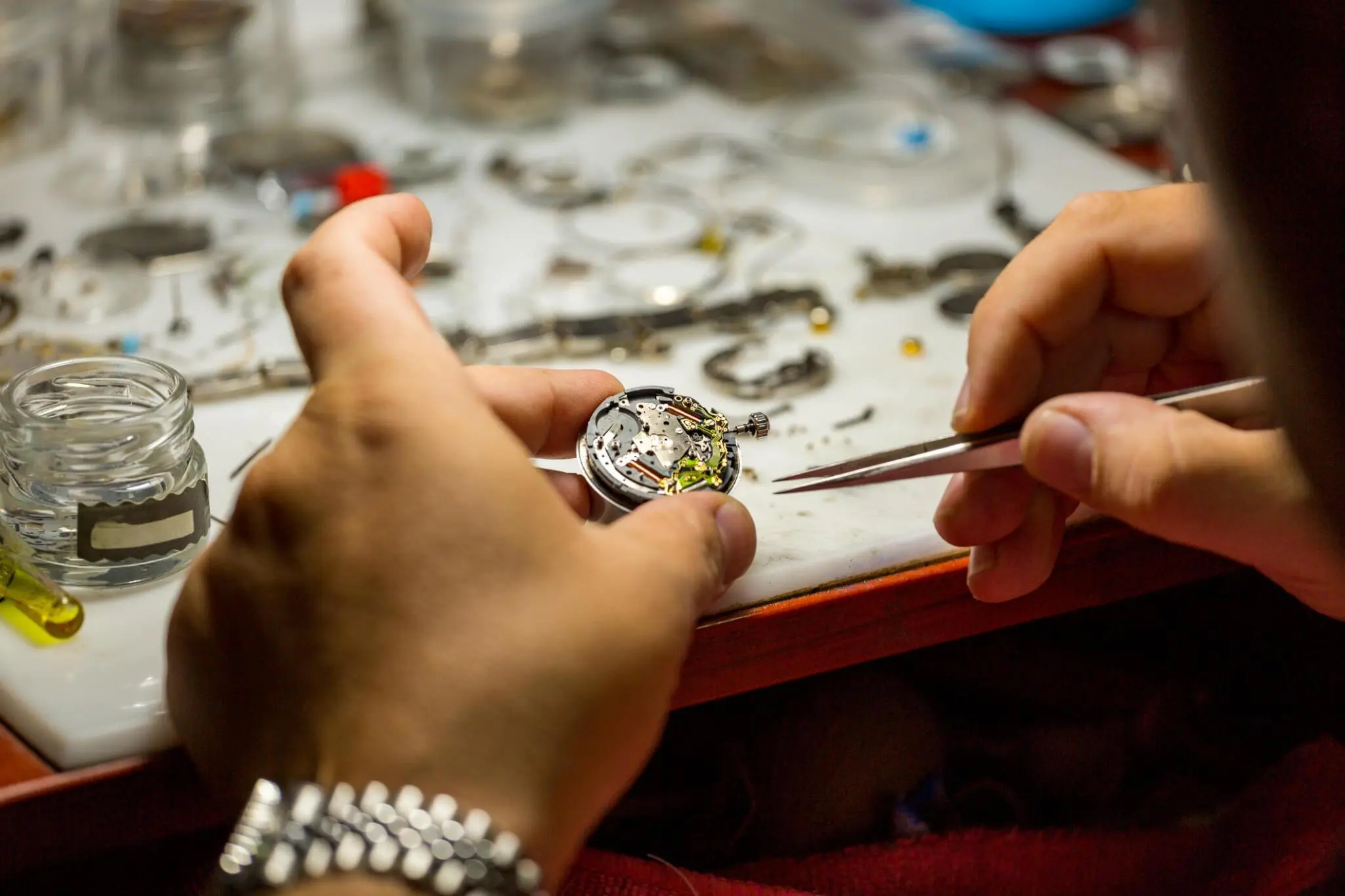 Expert luxury watch repair on silver timepiece