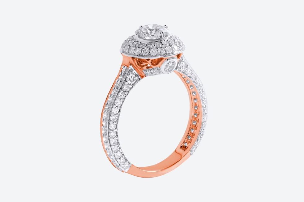 Rose gold and diamond halo engagement ring.