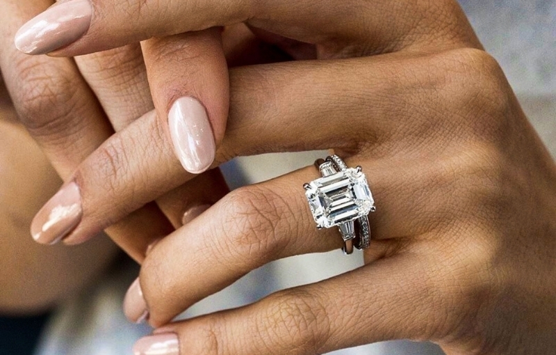 Emerald-cut diamond engagement ring.