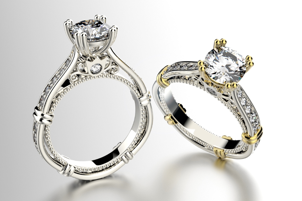 White gold filigree engagement ring with diamond.