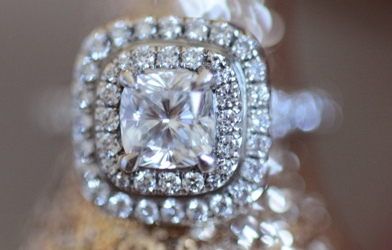 Milgrain detailing and intricate setting engagement ring.