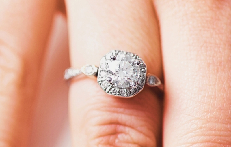 Vintage-style diamond engagement ring close-up.