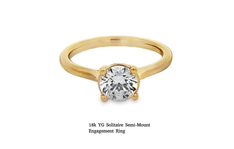 Vintage yellow gold solitaire diamond ring.