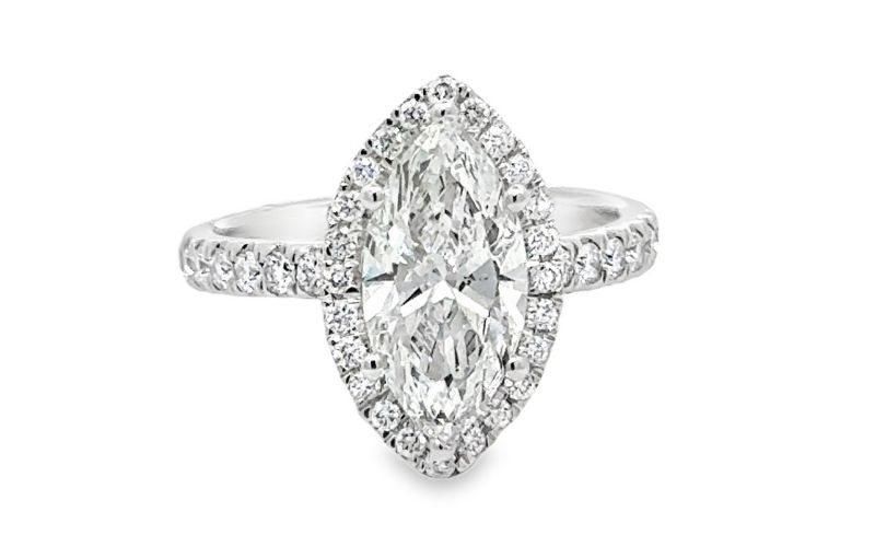 Art Deco designs marquise-cut center diamond.