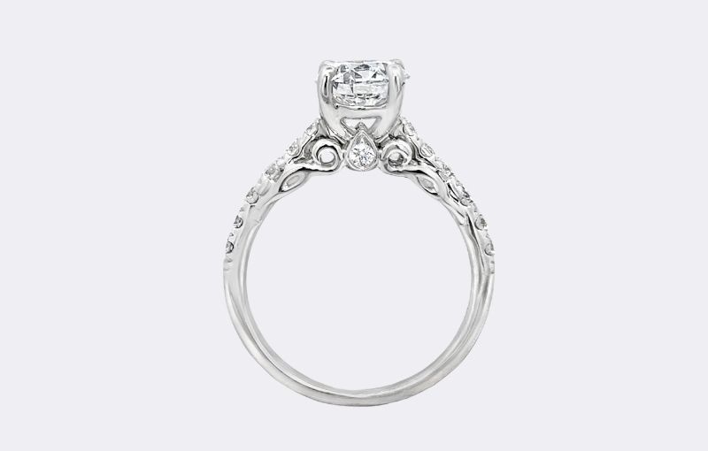 Classic diamond engagement ring with detailing.<br />
