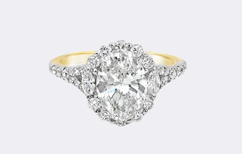 Oval diamond halo engagement ring.