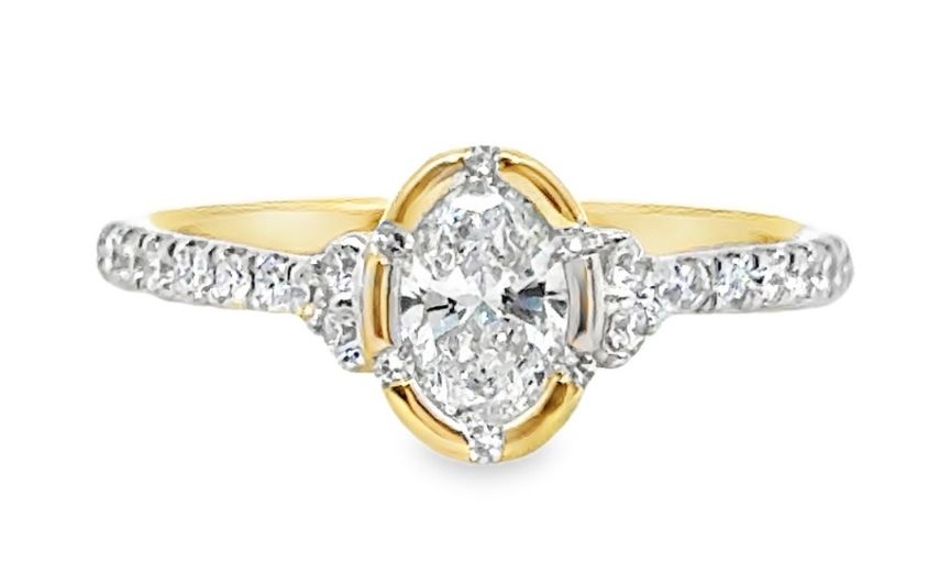 Modern yellow gold diamond engagement ring.