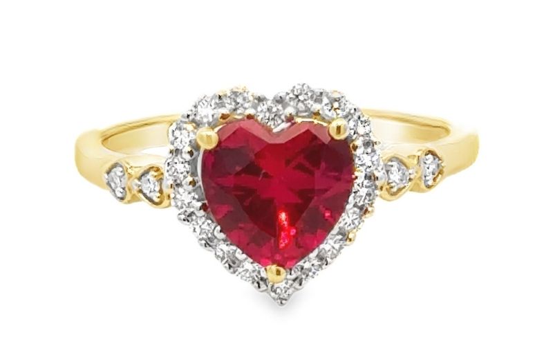 Heart-shaped ruby ring with diamonds.