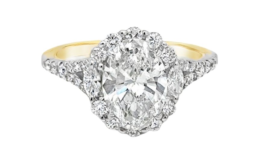 Oval diamond halo engagement ring.