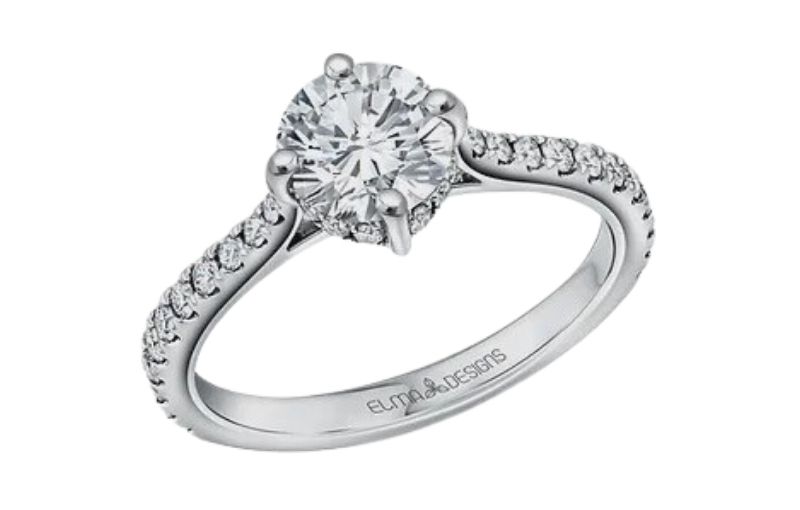 Round diamond engagement ring with pavé band.