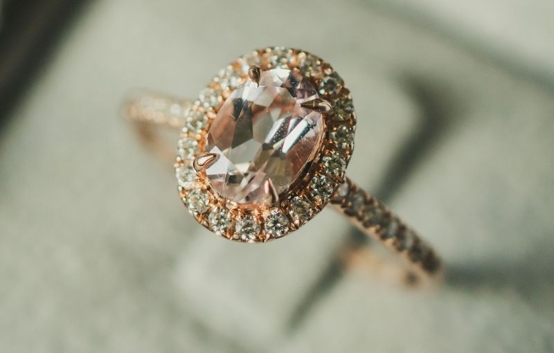 Rose gold morganite diamond halo ring.