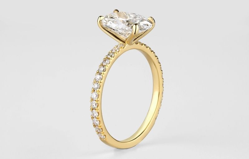 Yellow gold solitaire diamond engagement ring.