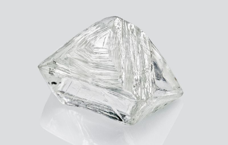 Uncut rough clear diamond crystal.