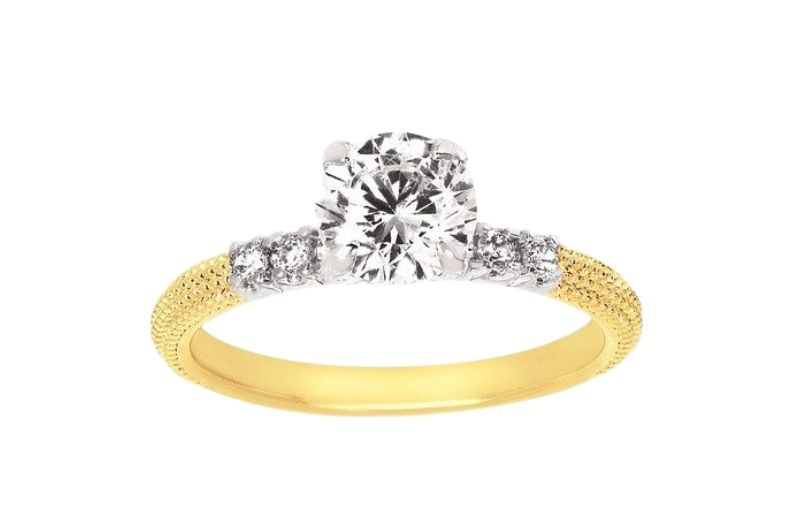 Yellow gold diamond solitaire engagement ring.