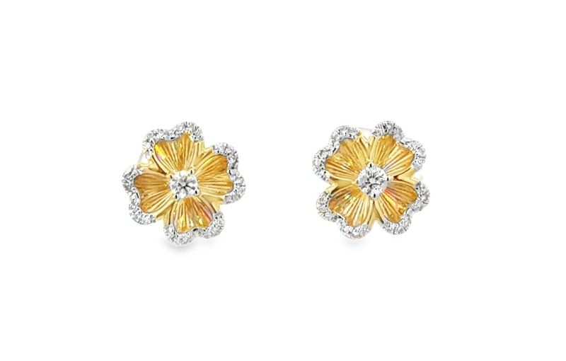 Yellow gold flower diamond earrings.<br />
