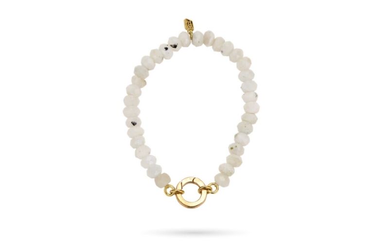 White stone bracelet with gold clasp.<br />
