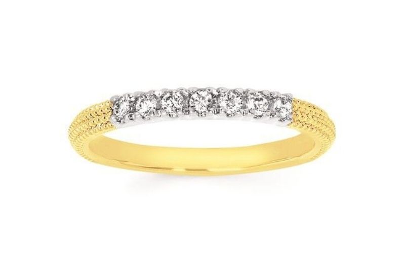 Yellow gold ring with diamonds.