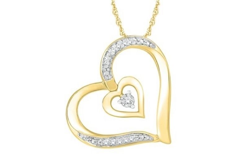 Gold double heart diamond pendant necklace.<br />
