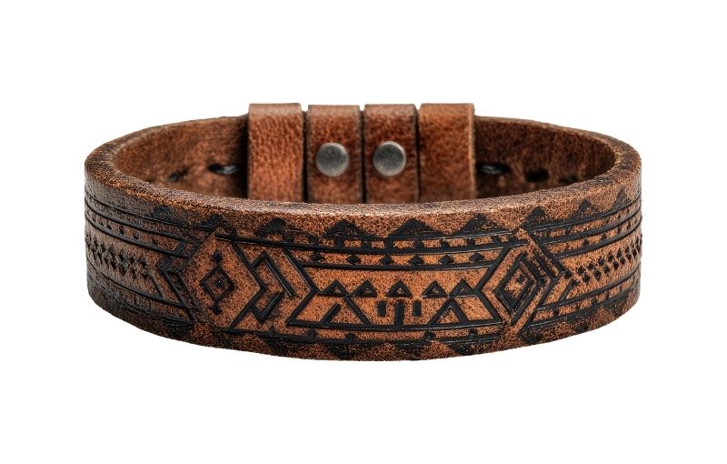 Brown tribal engraved leather bracelet.