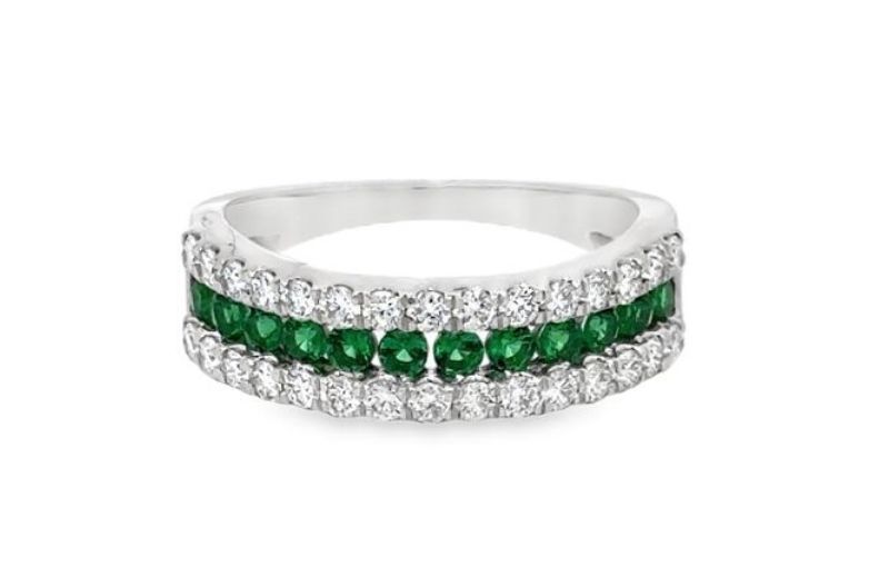 White gold ring with emeralds.