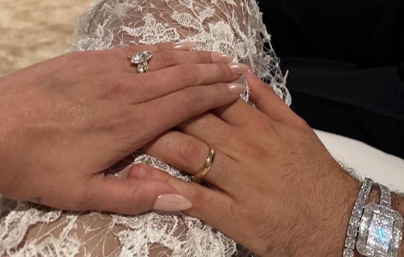 Selena Gomez and Benny Blanco displaying wedding rings.