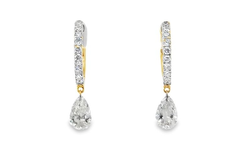 Gold diamond teardrop bridal earrings.