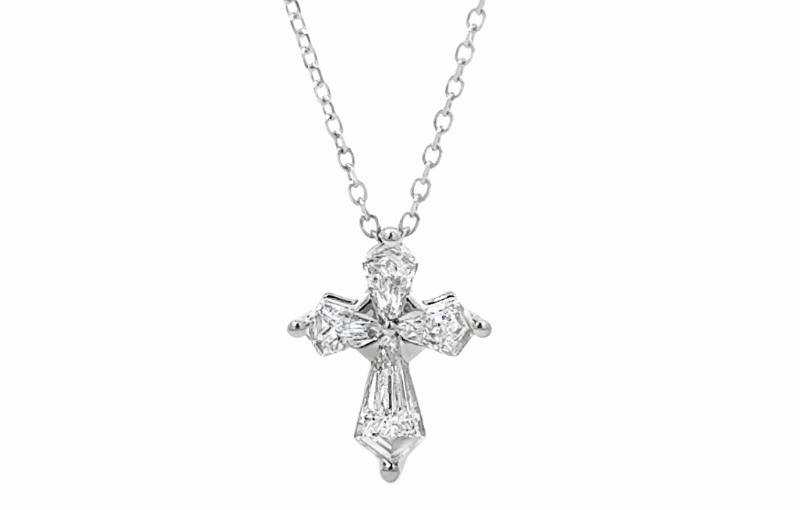Diamond cross pendant on chain.