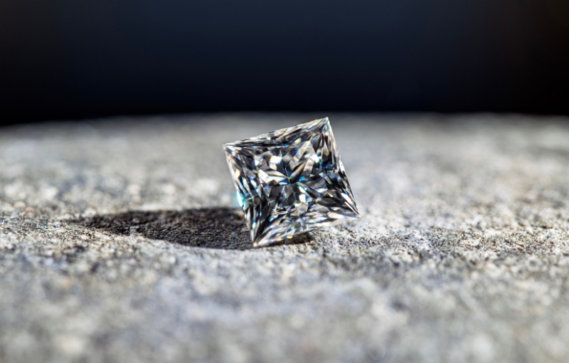 Loose princess cut diamond.