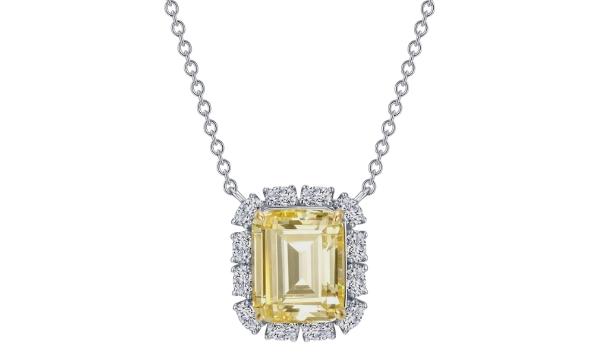 Yellow diamond halo pendant necklace.