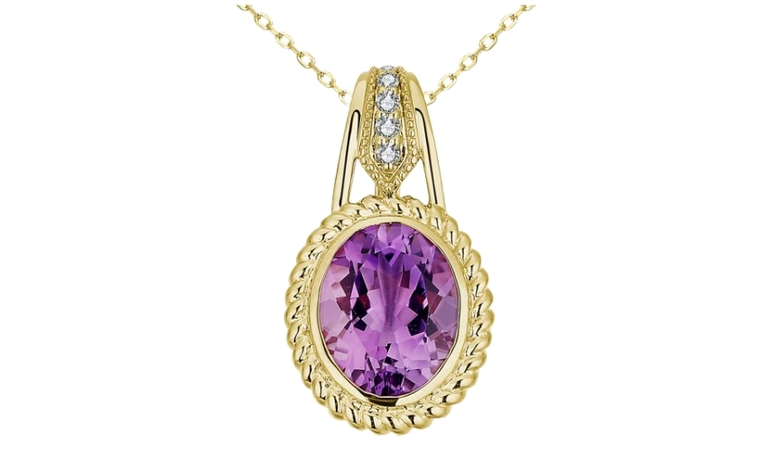 Yellow gold amethyst diamond pendant.