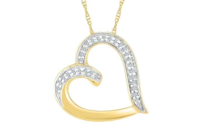 Gold heart pendant with diamonds.