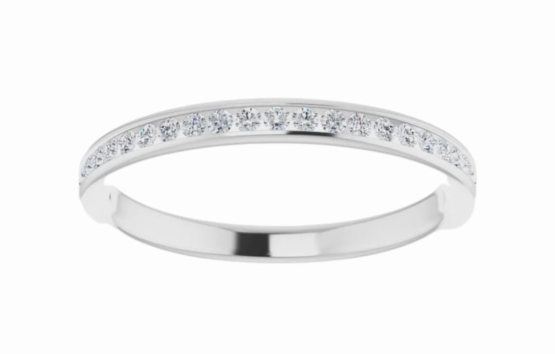 Platinum band with diamond inlay.