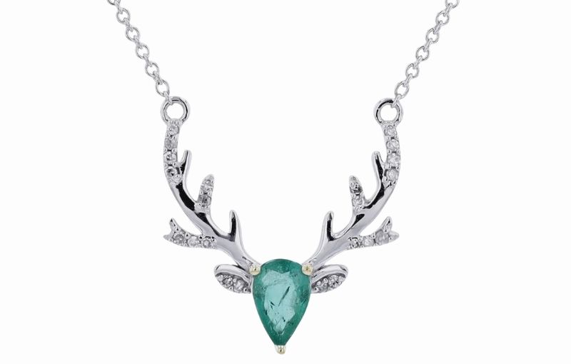 Antler design necklace with emerald.