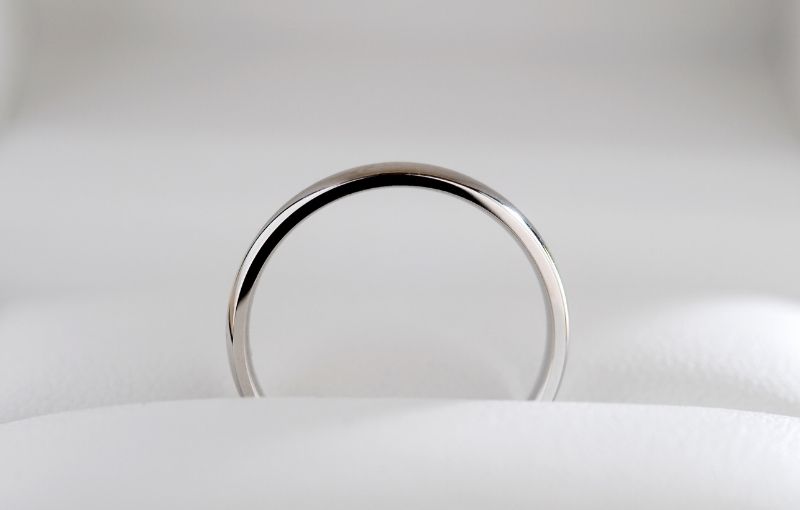 Titanium band with diamond accents.