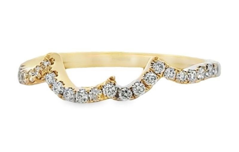 Yellow gold wave design with diamonds.