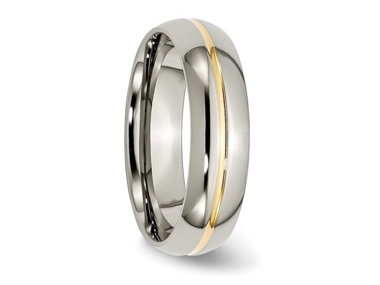 Titanium ring with gold inlay.