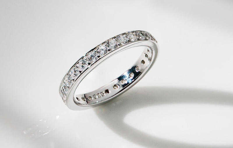 White gold eternity diamond wedding band.