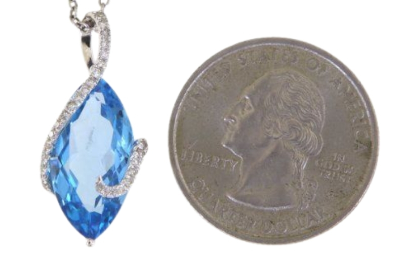 Marquise Diamond Shape pendant beside coin size.