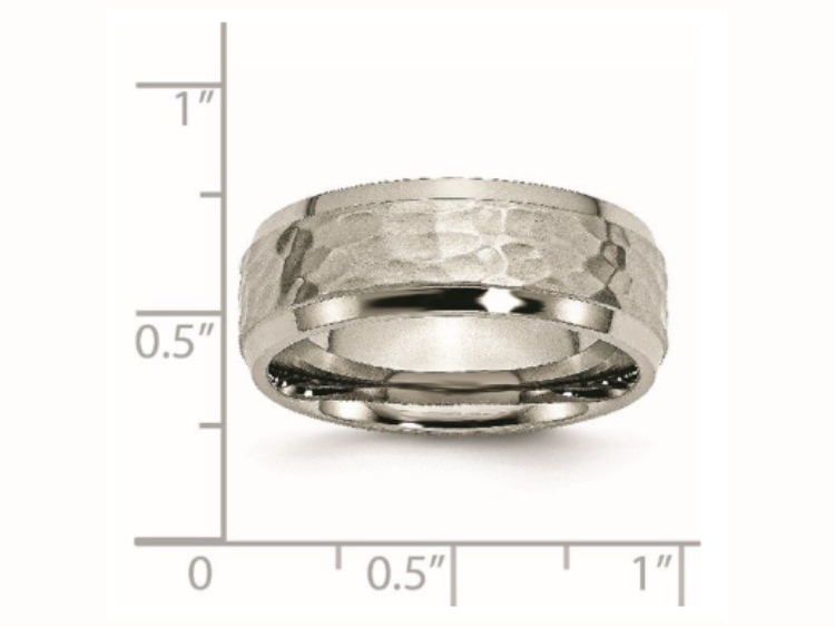 Hammered titanium ring with scale.
