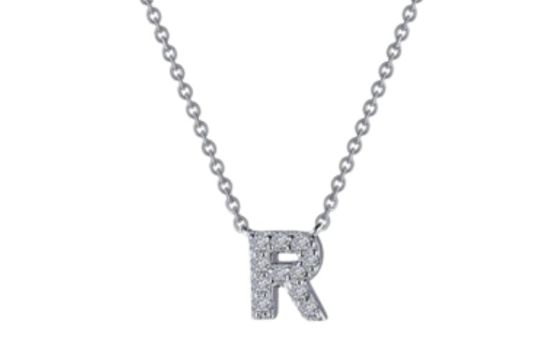 Silver diamond letter R pendant.