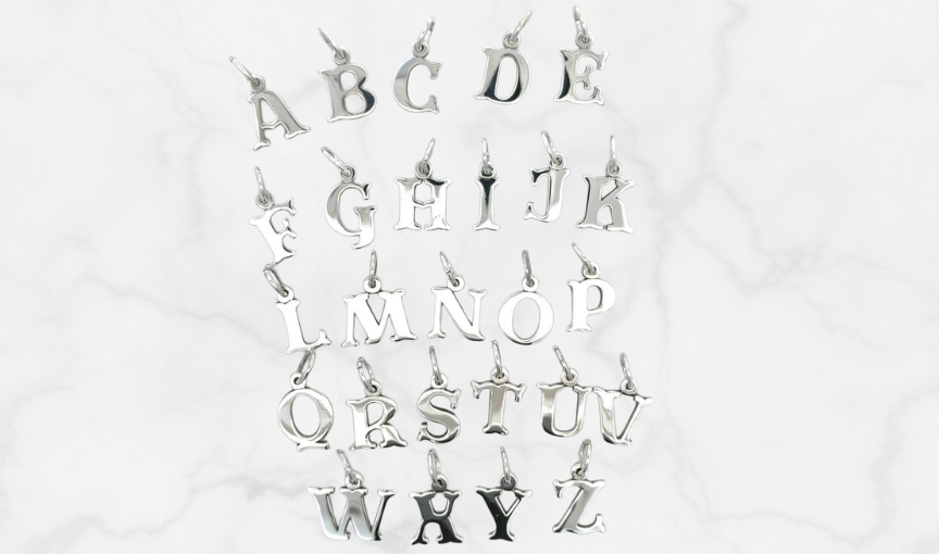 Silver alphabet initial charm collection.