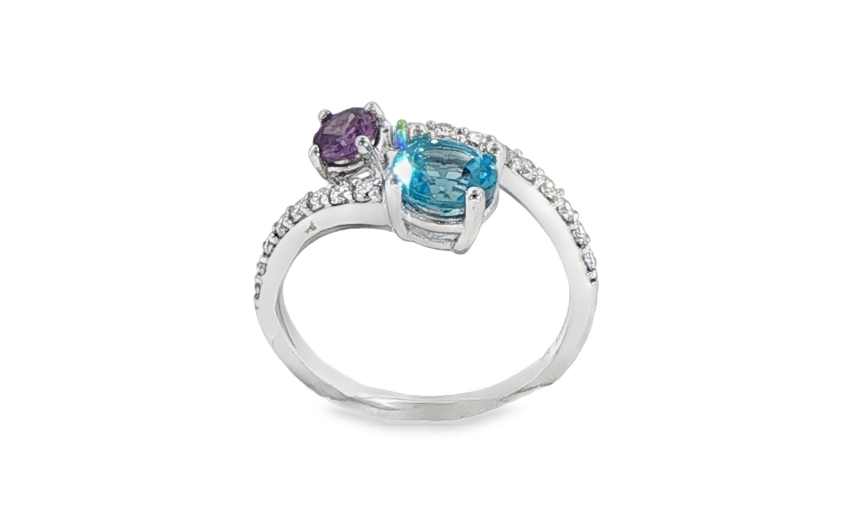 Blue and purple gemstone ring in white gold band