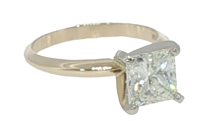 Princess cut diamond solitaire ring yellow gold band