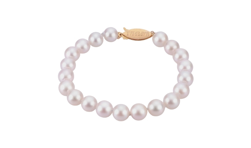 White pearl beaded bracelet with gold clasp closure