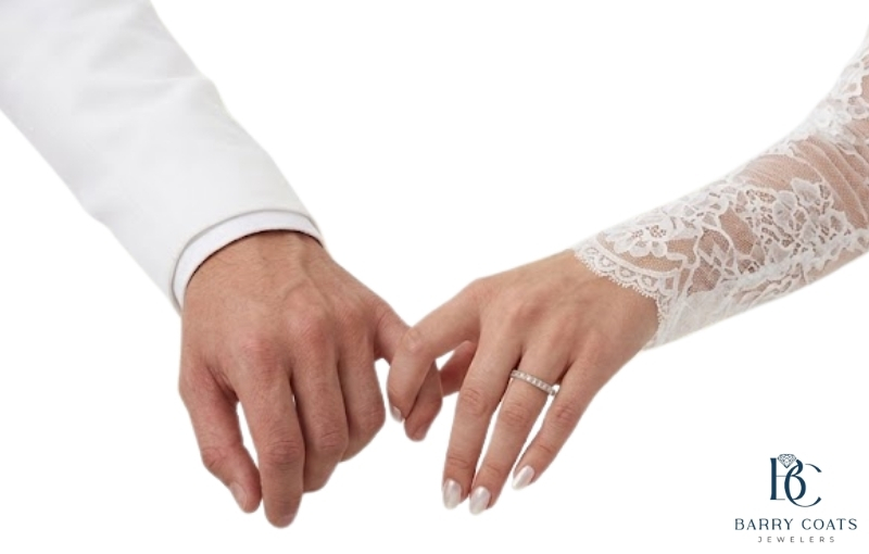 Diamond pavé wedding band on bride's hand