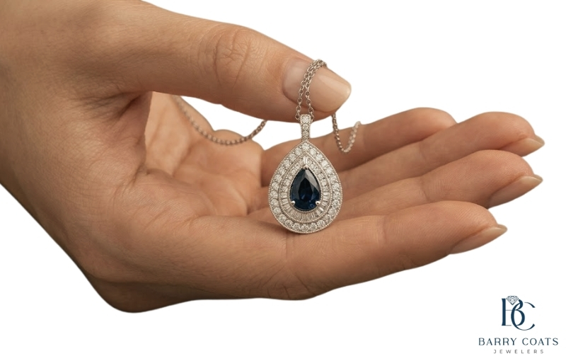 Pear sapphire pendant with diamond halo necklace