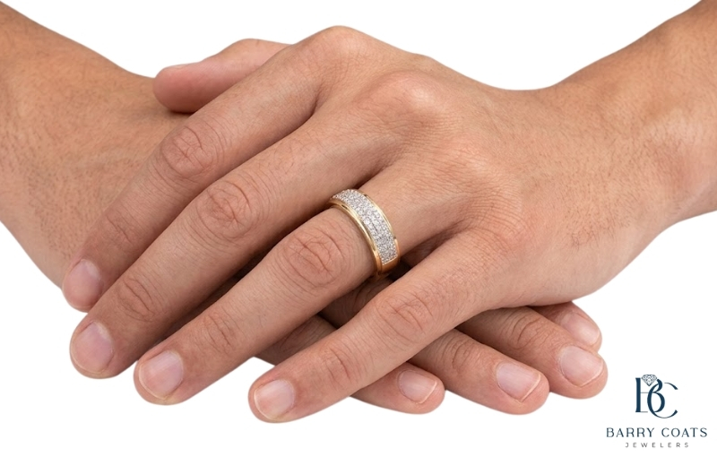 Men's diamond wedding band in yellow gold Diamond pavé wedding band on bride's hand