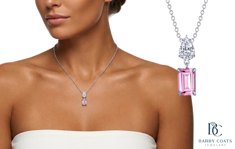 Pink gemstone pendant necklace worn by a woman White gold diamond pavé eternity ring close-up